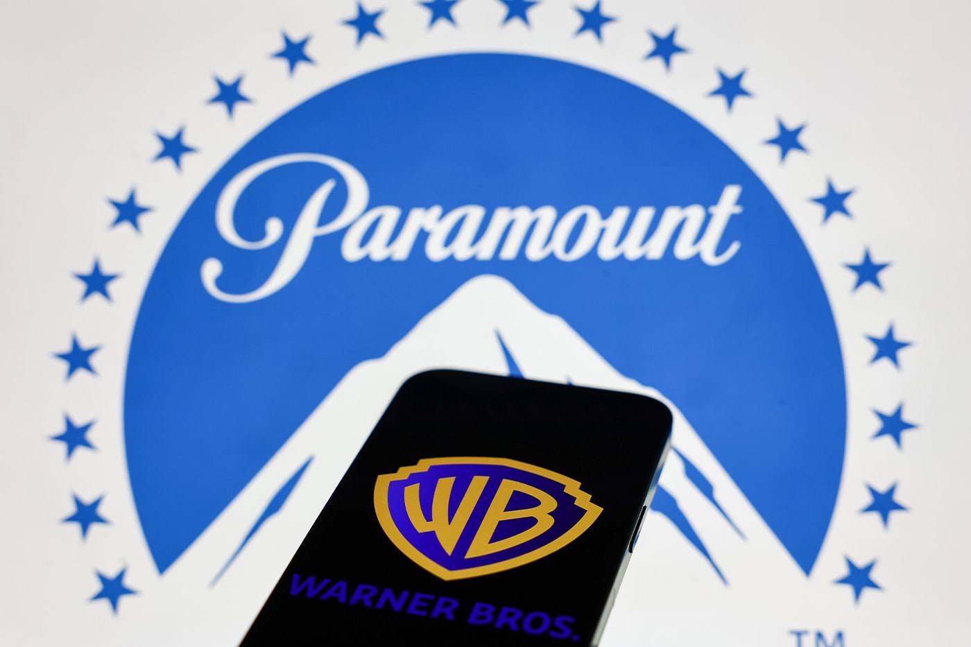 The Blockbuster Bottleneck: What the Paramount-Warner Bros. Merger Means for Hollywood's Future warner bros discovery paramount skydance a24 neon
