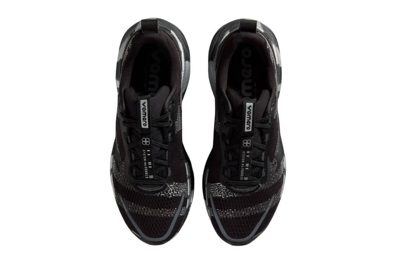 Nike Vomero 18 DSRPT in Iron Grey, Light Smoke Grey, and Black colorway showing abstract two-tone design on running shoe upper - detail view 5