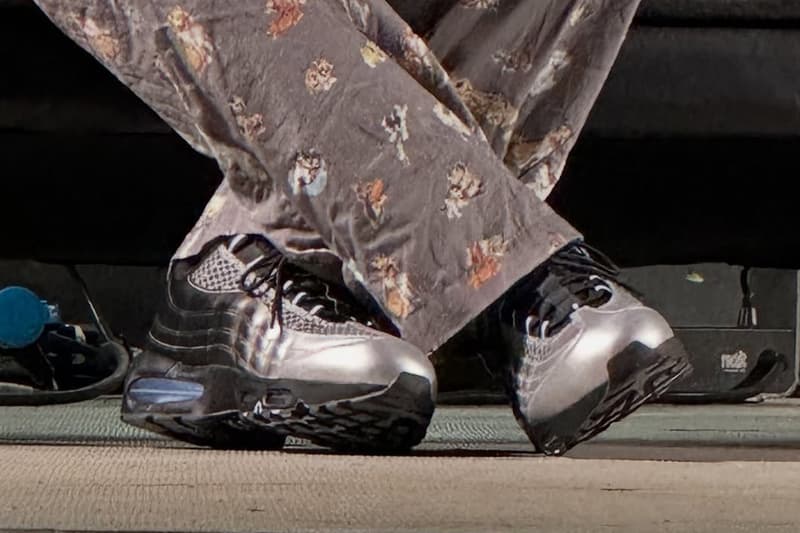 Palace x Nike Air Max 95 collaboration sneaker with black-to-silver gradient upper and icy blue sole unit accent - detail view 4