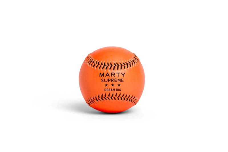 A24 Drops a Full Roster of Orange 'Marty Supreme' Sports Balls basketball soccer ball hockey puck golf ball tennis ball baseball ping pong