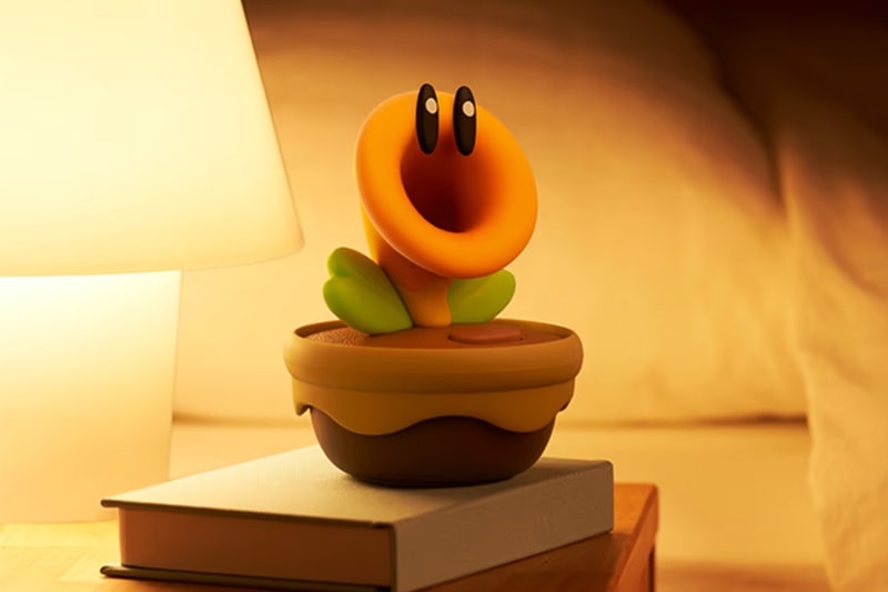 Nintendo Talking Flower desk toy based on Super Mario Bros. Wonder with clock and temperature display on a desk