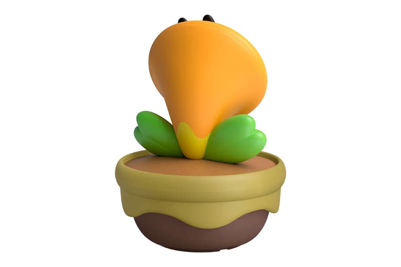 Nintendo Talking Flower desk toy based on Super Mario Bros. Wonder with clock and temperature display on a desk