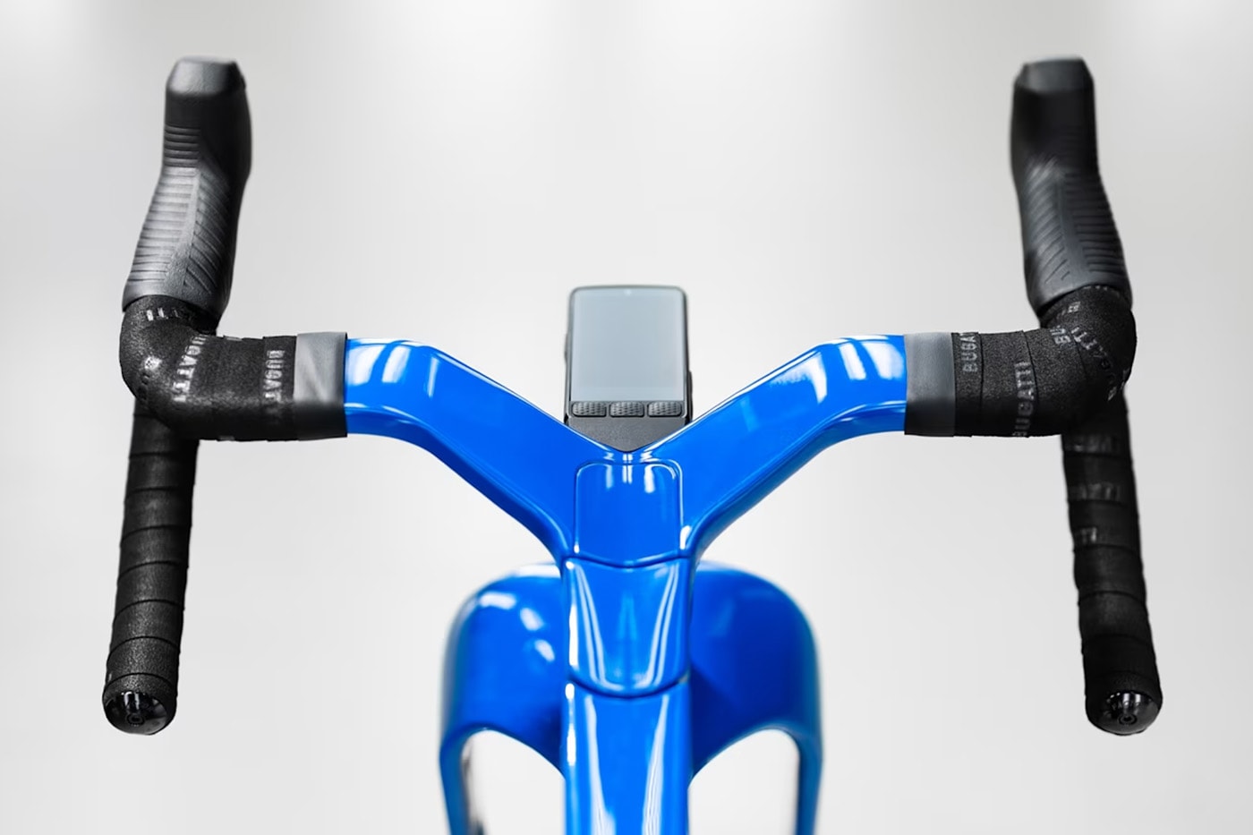 Bugatti Factor ONE aero road bike in Bugatti Blue with wide fork stance and Dancing Elephant emblem