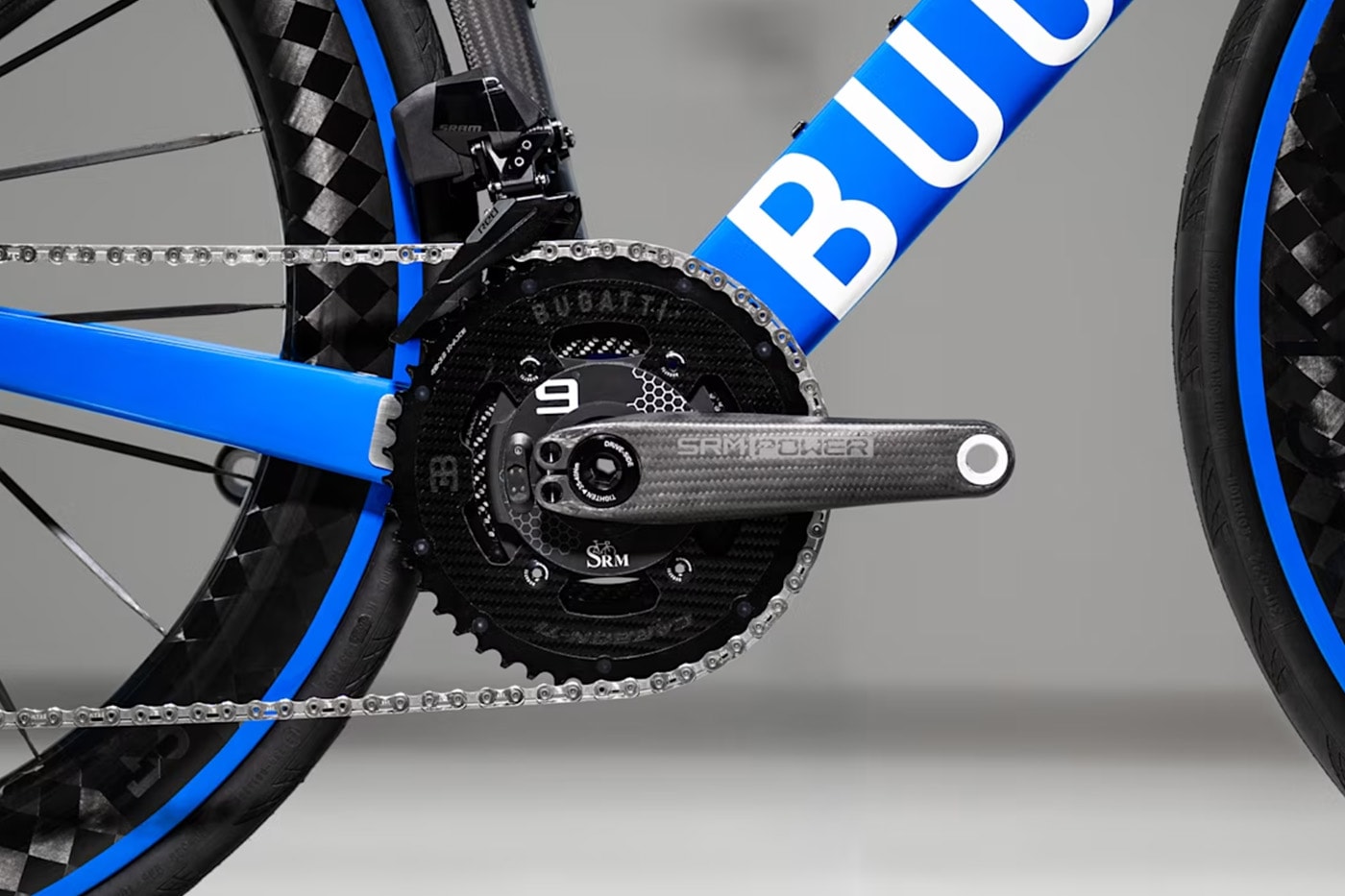 Bugatti Factor ONE aero road bike in Bugatti Blue with wide fork stance and Dancing Elephant emblem