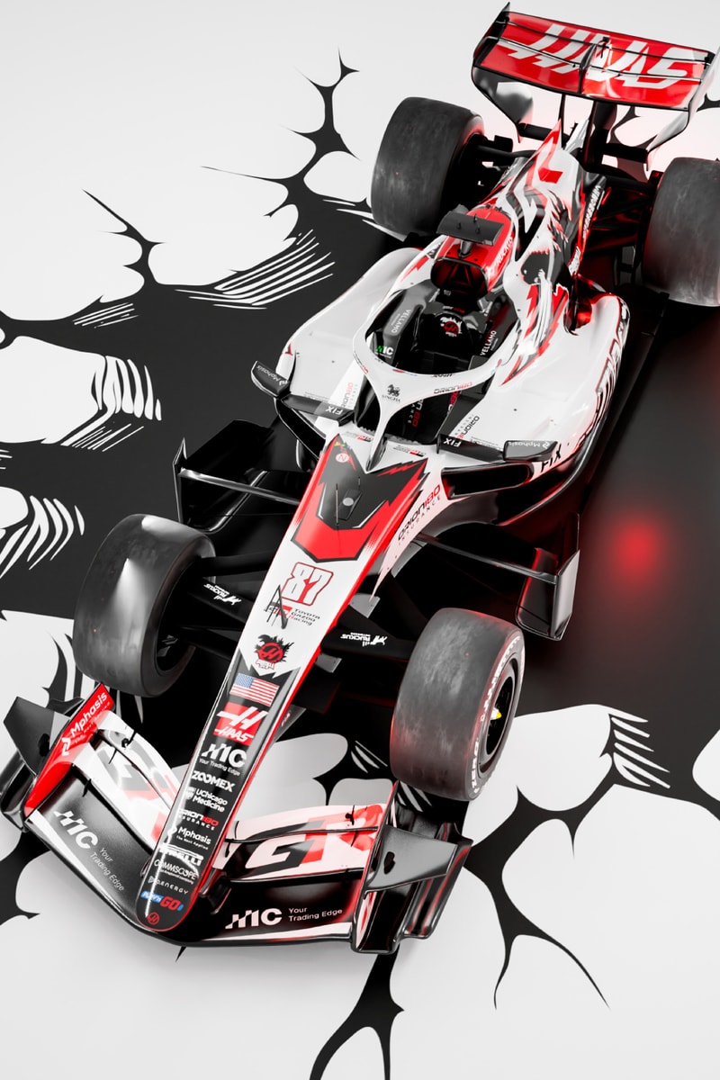 Haas F1 car in Godzilla-themed livery promoting Godzilla Minus Zero at the 2026 Japanese Grand Prix