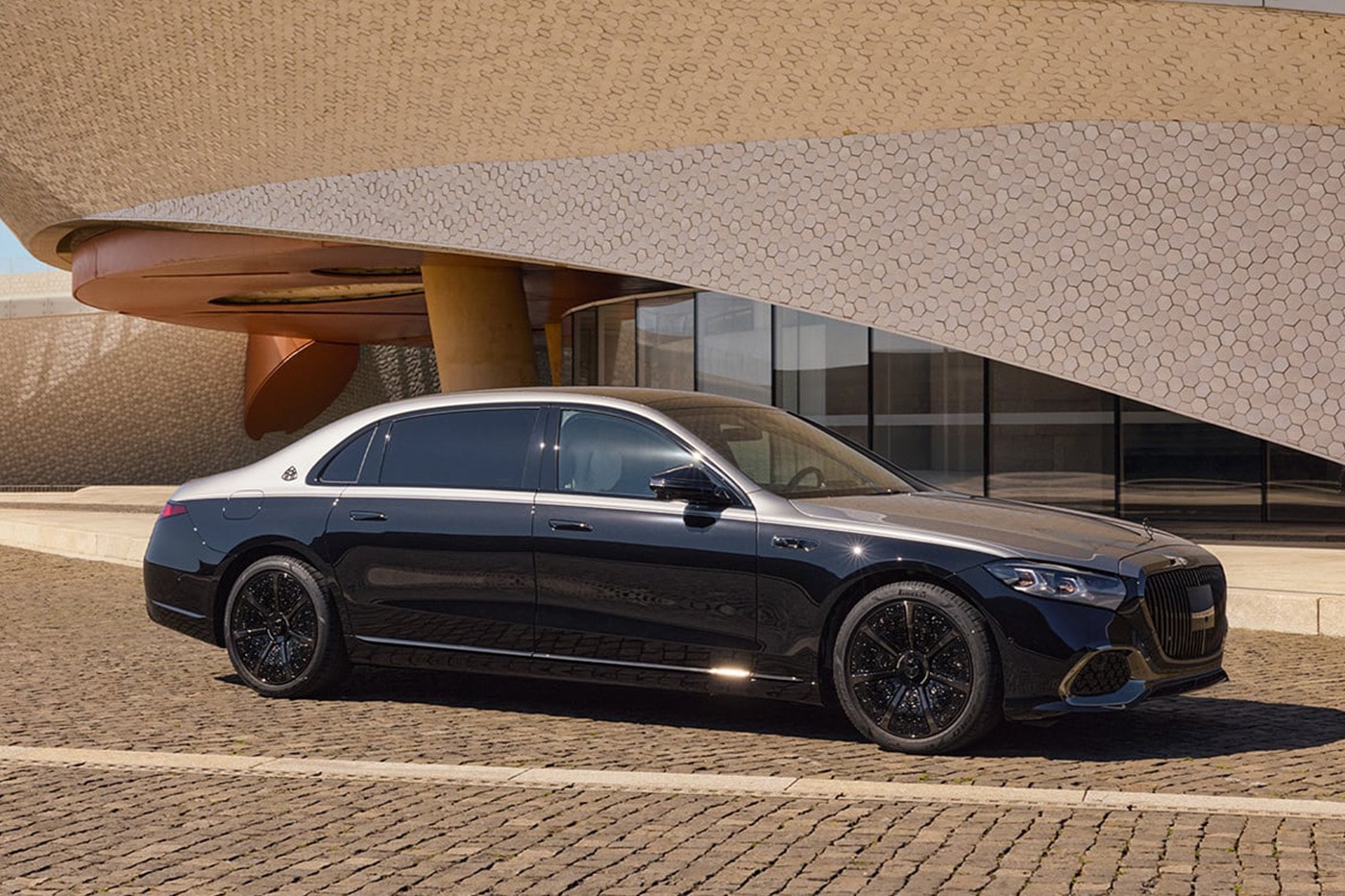 2027 Mercedes-Maybach S-Class luxury sedan with illuminated grille and MBUX Superscreen interior