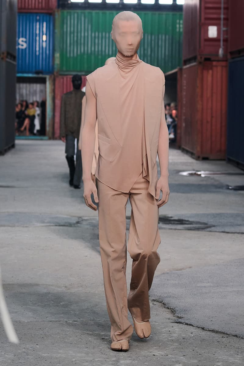 Maison Margiela FW26 Shanghai Fashion Week Collection Glenn Martens Maison Margiela FW26 Brings a Parisian Flea Market to a Shanghai Shipyard Artisanal ready to wear