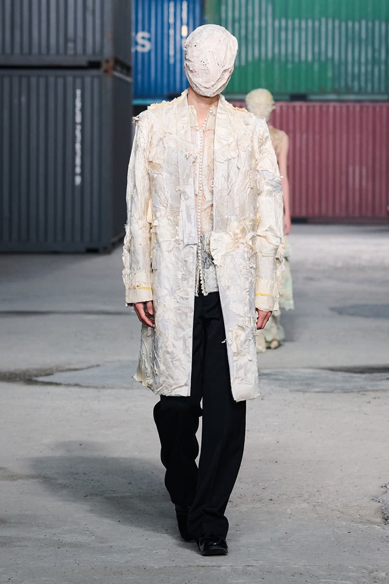 Maison Margiela FW26 Shanghai Fashion Week Collection Glenn Martens Maison Margiela FW26 Brings a Parisian Flea Market to a Shanghai Shipyard Artisanal ready to wear