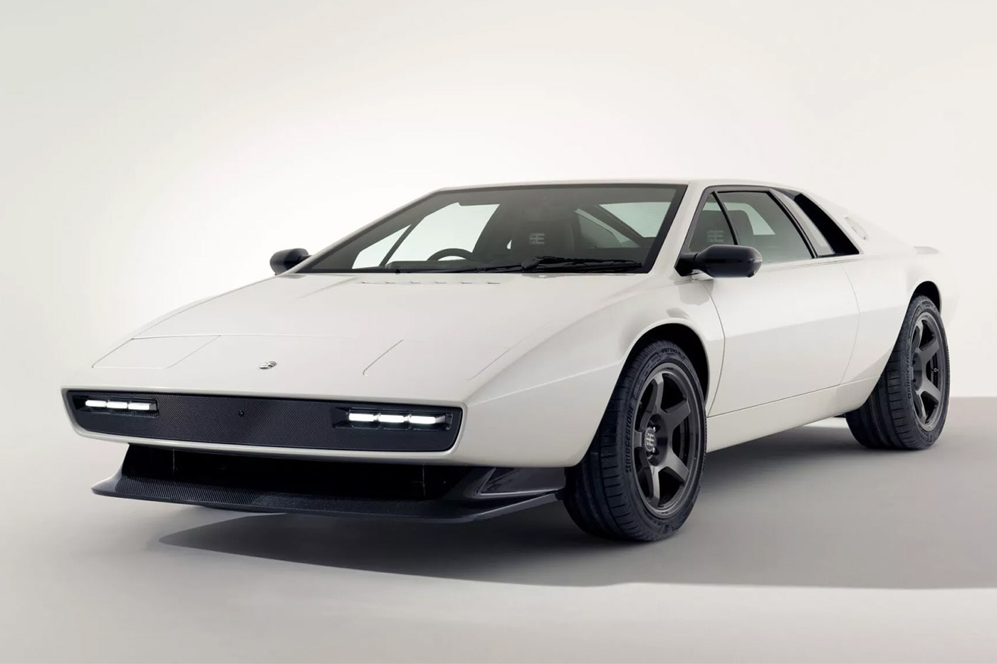 Encor Series 1 carbon-fiber Lotus Esprit restomod with analog-focused cockpit and modern details