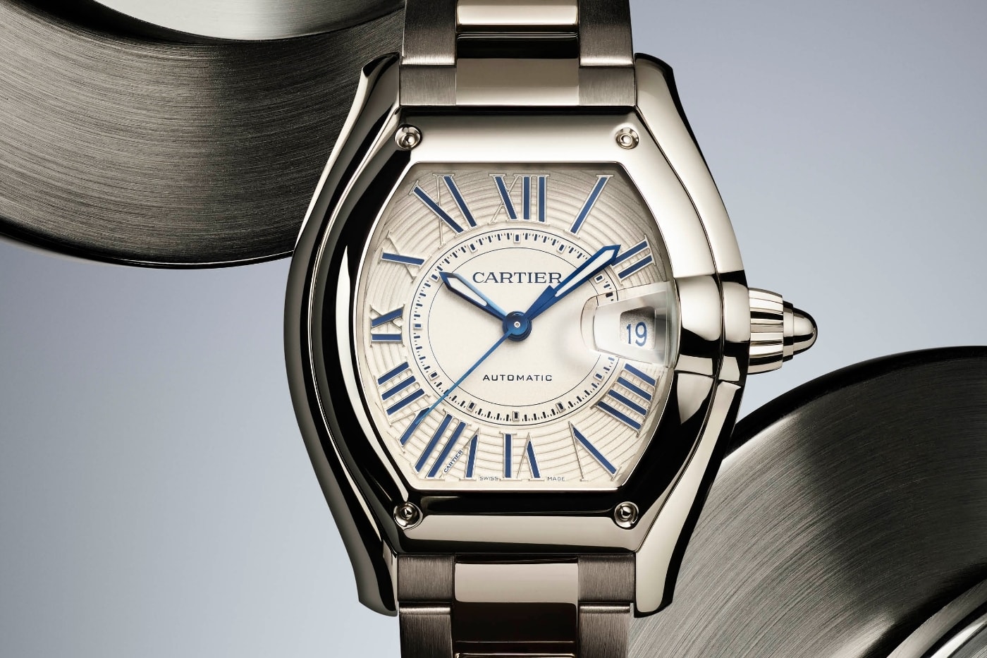Cartier Santos-Dumont with obsidian dial and gold mesh bracelet