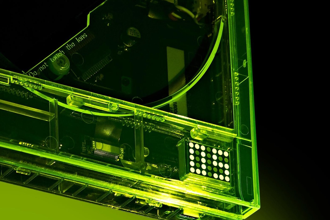 km5 Gives Transparent Tech a High-Voltage Facelift With Its New Neon Audio Collection cd players earphones headphones