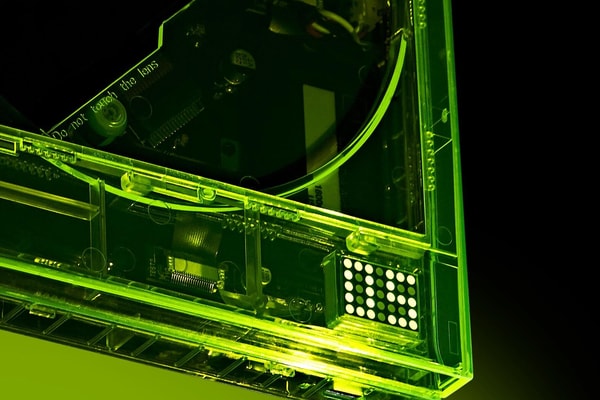 km5 Gives Transparent Tech a High-Voltage Facelift With Its New Neon Audio Collection cd players earphones headphones