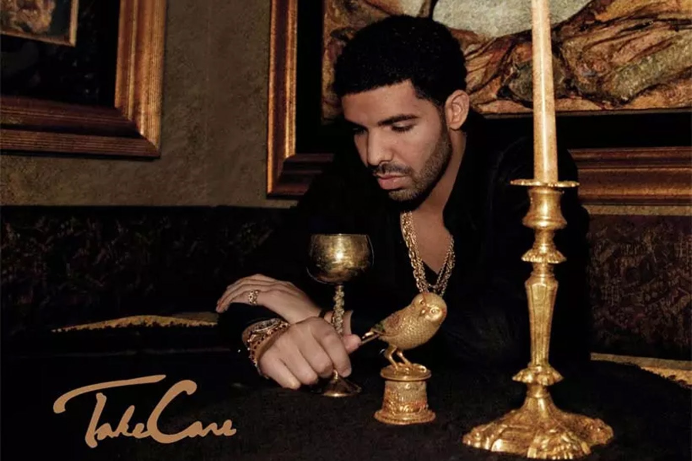 Drake Rolex GMT-Master II in yellow gold with factory baguette diamonds and black sapphires from the Take Care album cover
