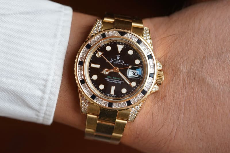 Drake Rolex GMT-Master II in yellow gold with factory baguette diamonds and black sapphires from the Take Care album cover