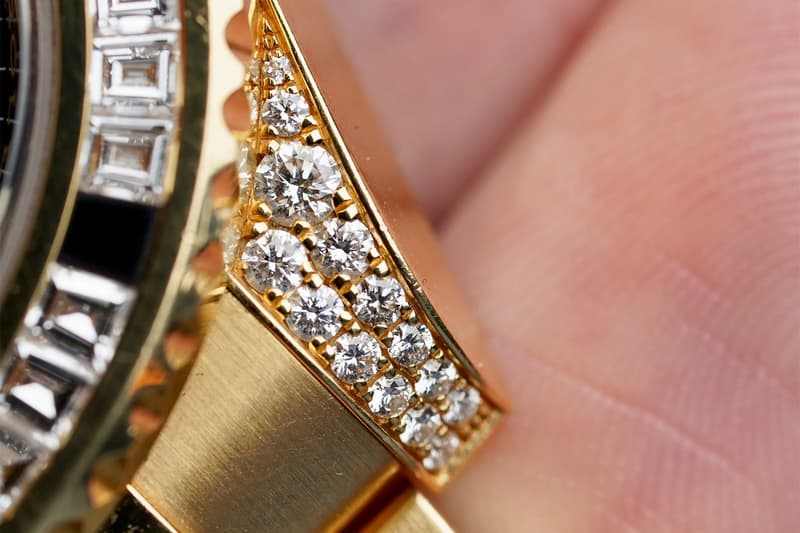 Drake Rolex GMT-Master II in yellow gold with factory baguette diamonds and black sapphires from the Take Care album cover