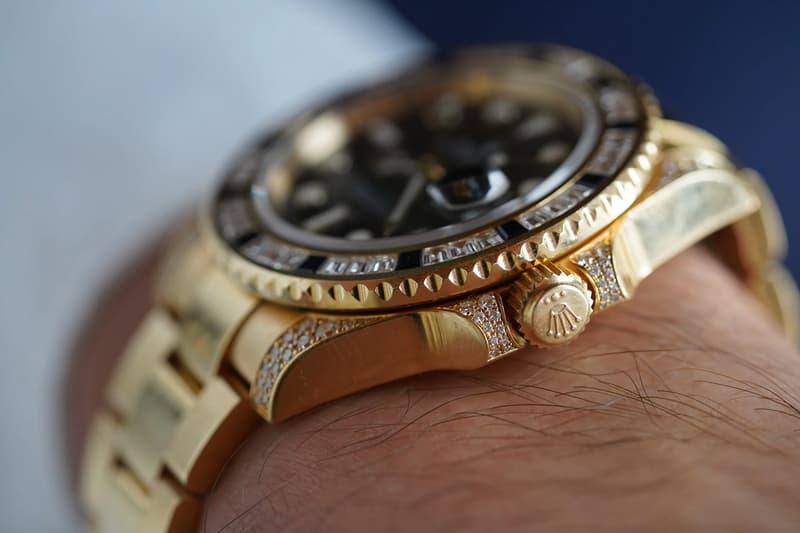 Drake Rolex GMT-Master II in yellow gold with factory baguette diamonds and black sapphires from the Take Care album cover