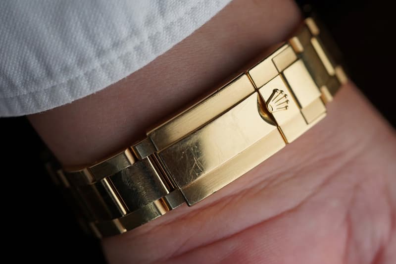 Drake Rolex GMT-Master II in yellow gold with factory baguette diamonds and black sapphires from the Take Care album cover