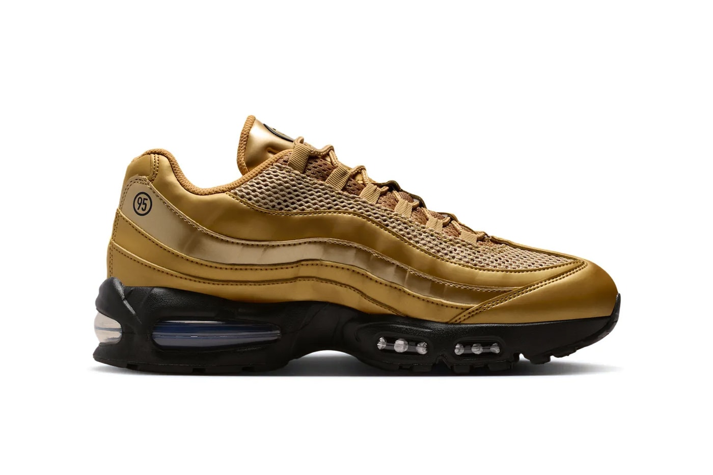 Nike Air Max 95 Total 90 Metallic Gold, close-up of T90 circular tongue branding