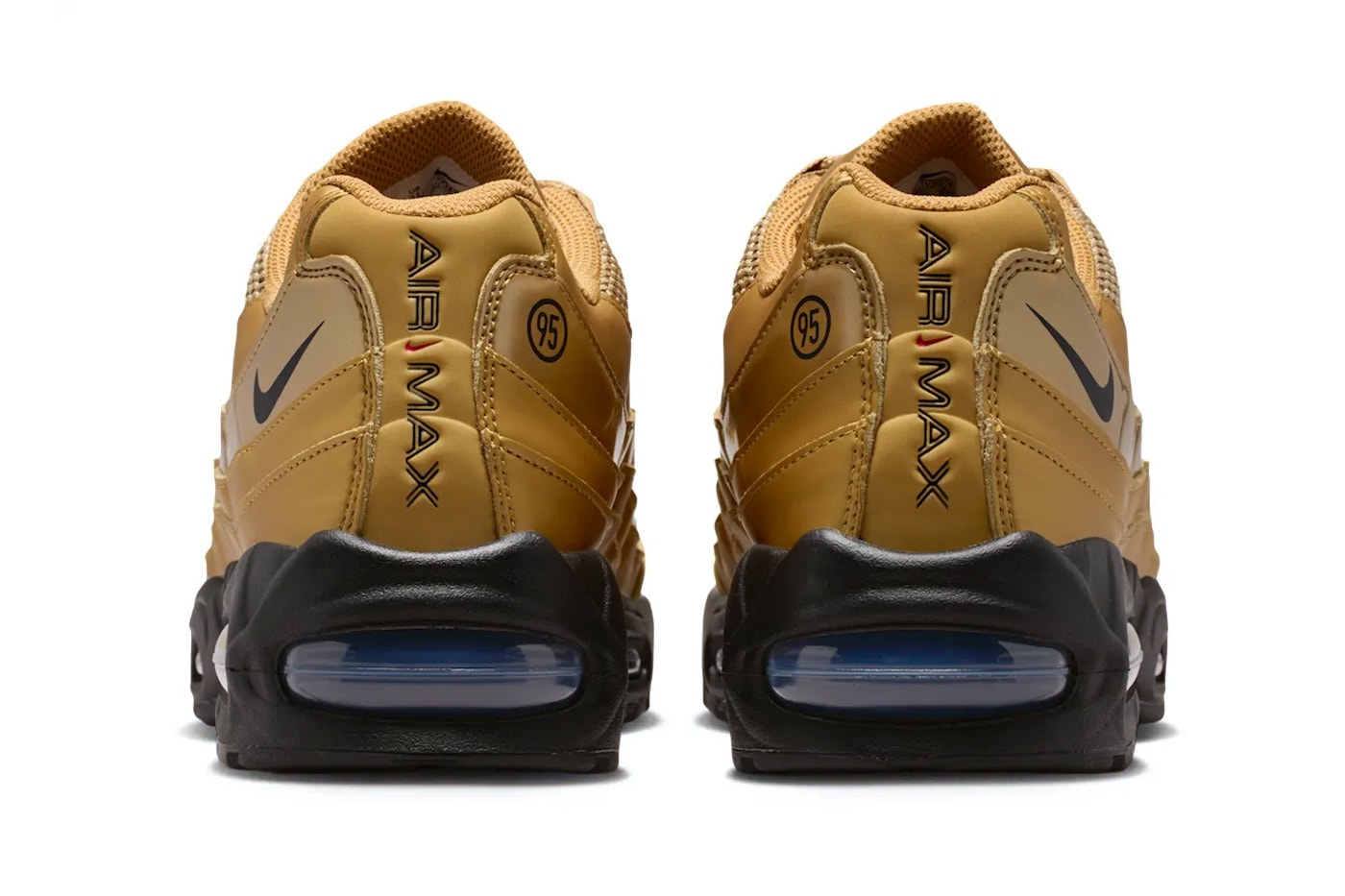 Nike Air Max 95 Total 90 Metallic Gold, pair on display