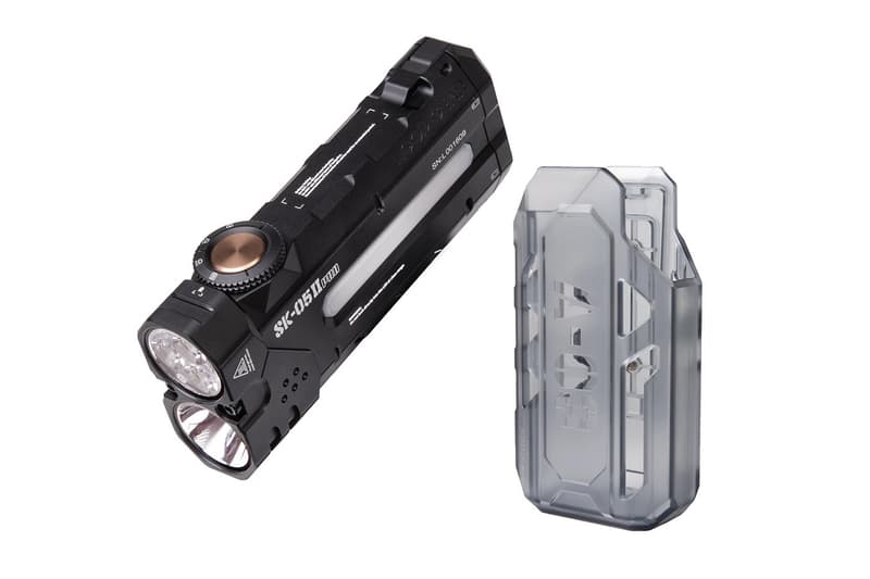 LOOPGEAR SK05 Pro 2 dual-beam flashlight with 5000 lumens and USB-C power bank in rugged EDC setup