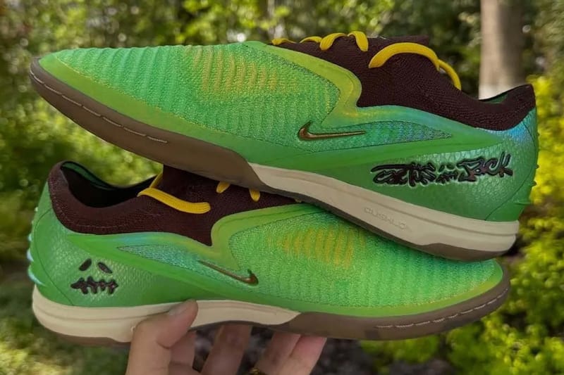 Travis Scott x Nike Phantom 6 Low Elite FG on foot showing full green and brown colourway with flame soleplate