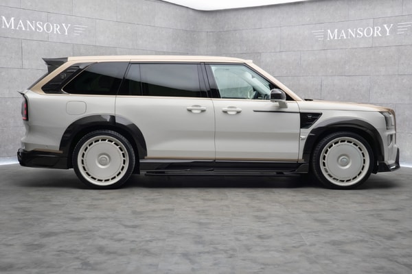 Mansory Zeekr 9X widebody SUV in white and bronze with carbon fiber bodywork at Auto China 2026