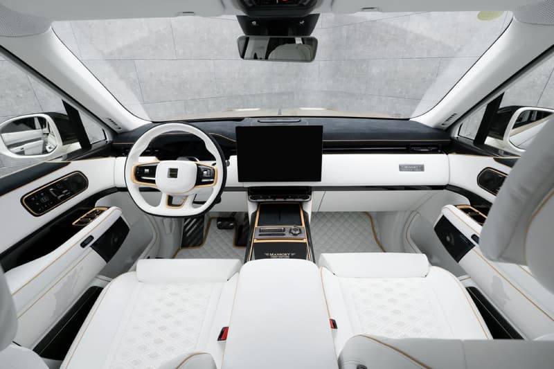 Mansory Zeekr 9X widebody SUV in white and bronze with carbon fiber bodywork at Auto China 2026