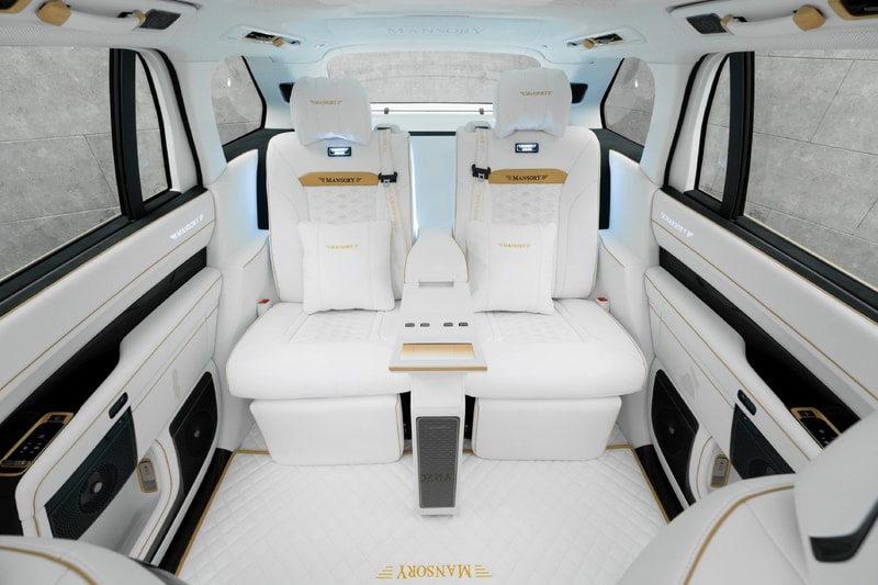 Mansory Zeekr 9X widebody SUV in white and bronze with carbon fiber bodywork at Auto China 2026