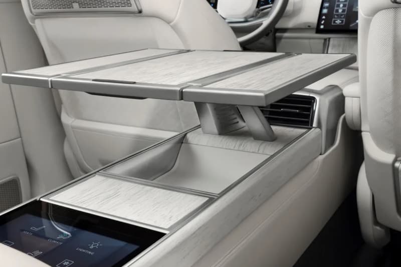 Range Rover SV Ultra in Titan Silver showcasing liquid-metal paint and ultra-luxury SUV presence