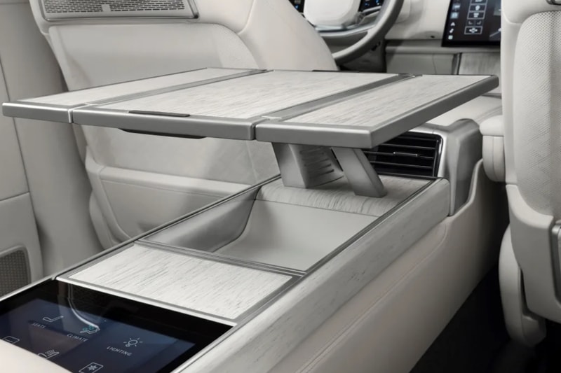 Range Rover SV Ultra in Titan Silver showcasing liquid-metal paint and ultra-luxury SUV presence