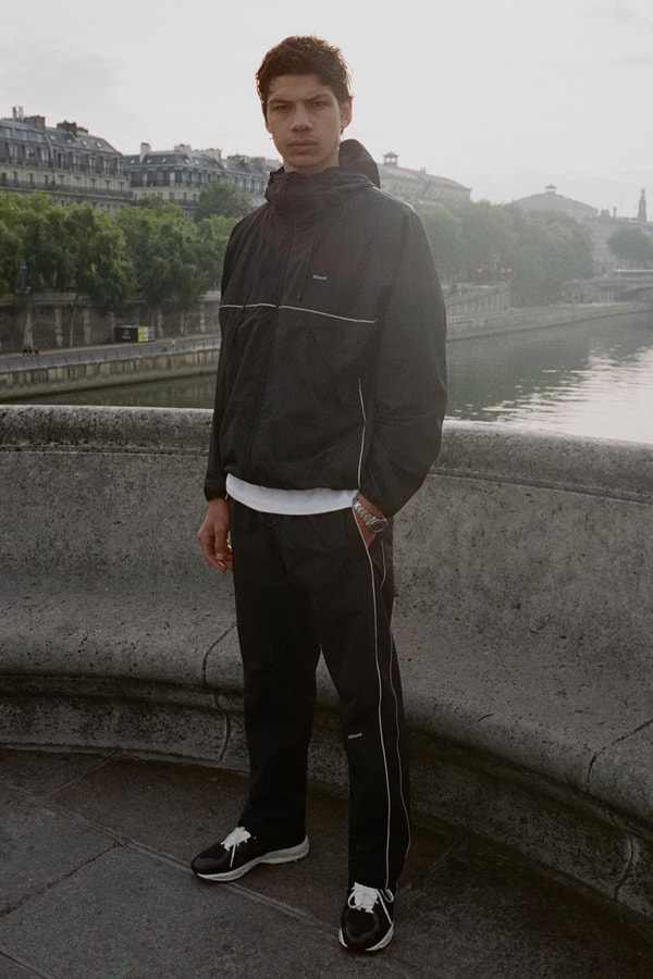 JJJJound Elevates the Tracksuit With Its Latest Drop justin saunder montreal Reflective Stripe Track Pant and Full Zip Parka