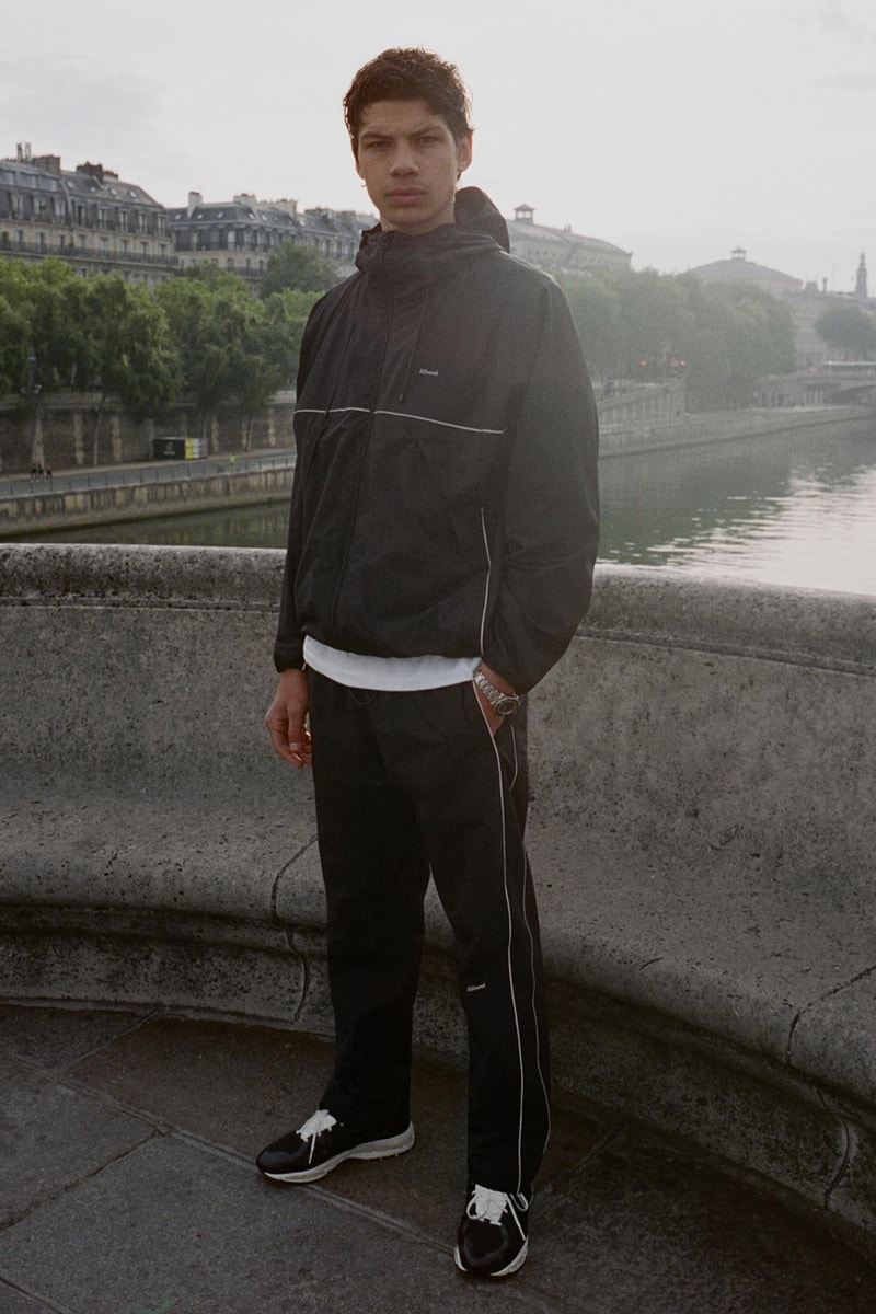 JJJJound Elevates the Tracksuit With Its Latest Drop justin saunder montreal Reflective Stripe Track Pant and Full Zip Parka