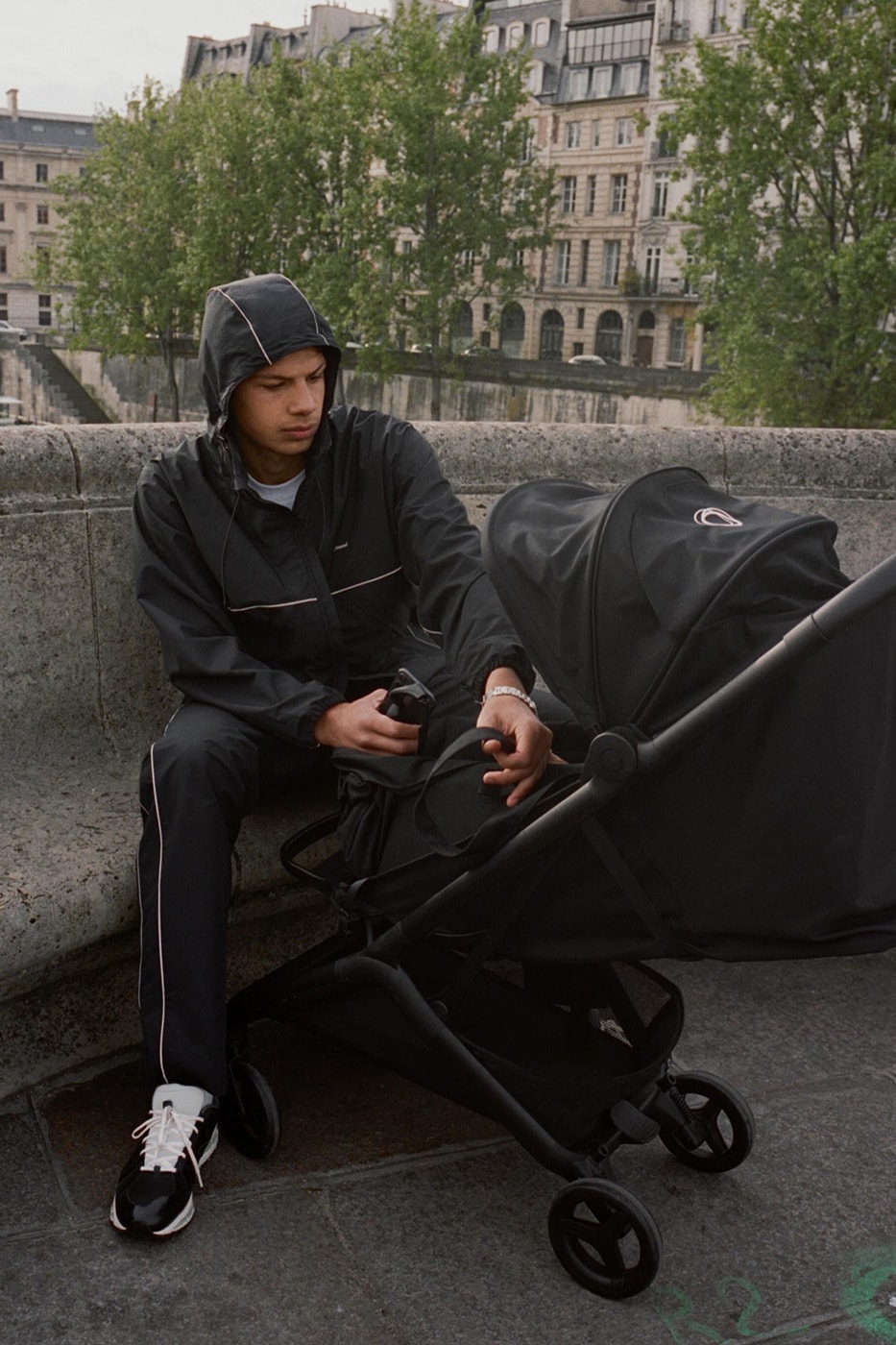 JJJJound Elevates the Tracksuit With Its Latest Drop justin saunder montreal Reflective Stripe Track Pant and Full Zip Parka