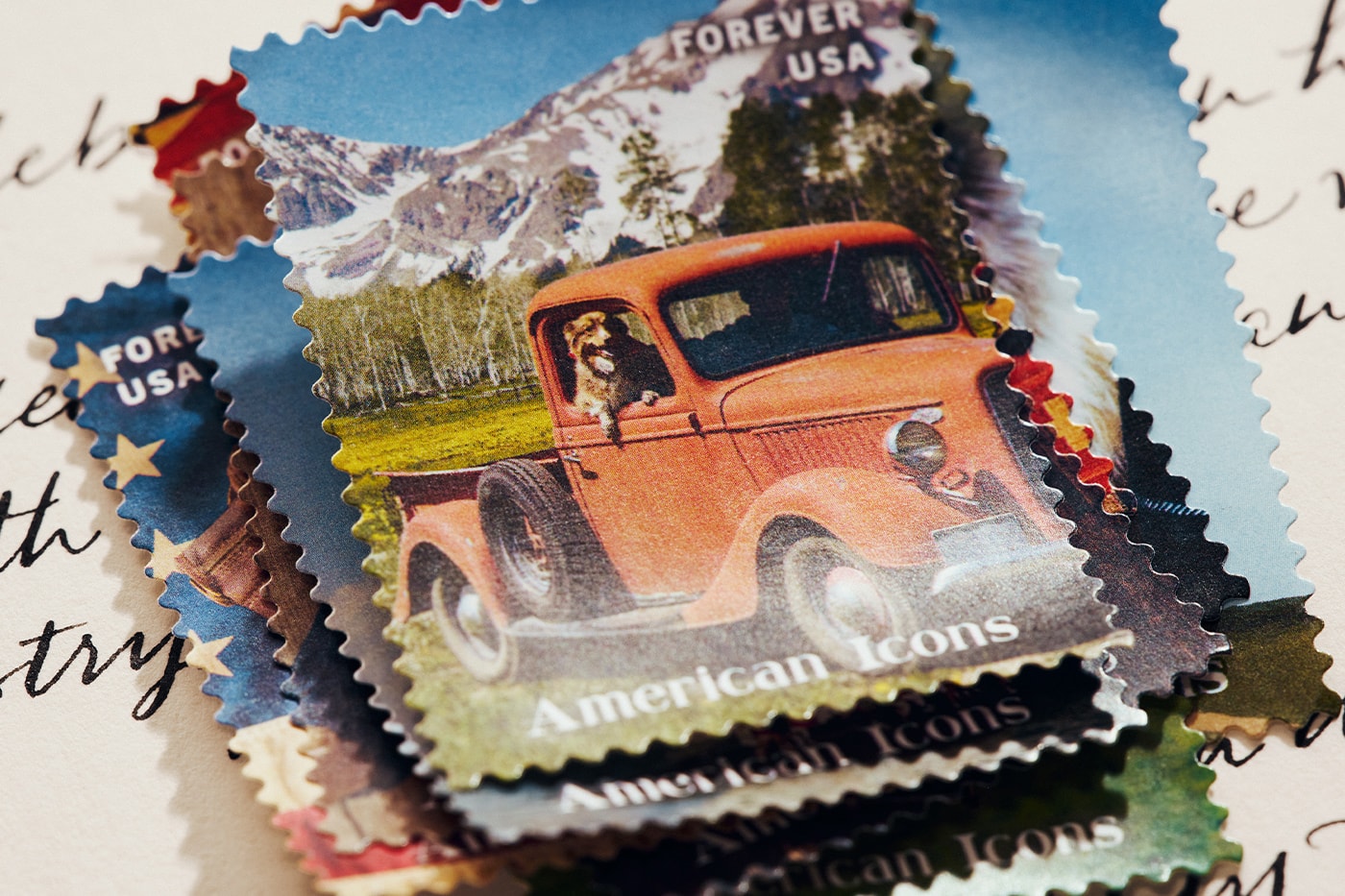 Special Delivery: Ralph Lauren Curates Historic USPS Stamp Collection for America's 250th Anniversary exclusive apparel capsule American Flag Sweater, a classic Polo Shirt, and a tailored Ball Cap united states accessories