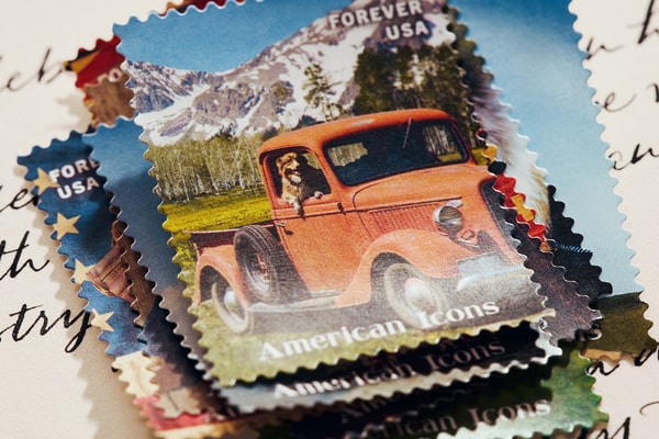 Special Delivery: Ralph Lauren Curates Historic USPS Stamp Collection for America's 250th Anniversary exclusive apparel capsule American Flag Sweater, a classic Polo Shirt, and a tailored Ball Cap united states accessories