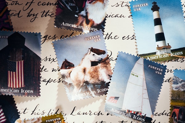 Special Delivery: Ralph Lauren Curates Historic USPS Stamp Collection for America's 250th Anniversary exclusive apparel capsule American Flag Sweater, a classic Polo Shirt, and a tailored Ball Cap united states accessories