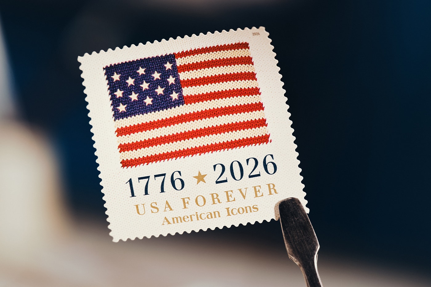 Special Delivery: Ralph Lauren Curates Historic USPS Stamp Collection for America's 250th Anniversary exclusive apparel capsule American Flag Sweater, a classic Polo Shirt, and a tailored Ball Cap united states accessories