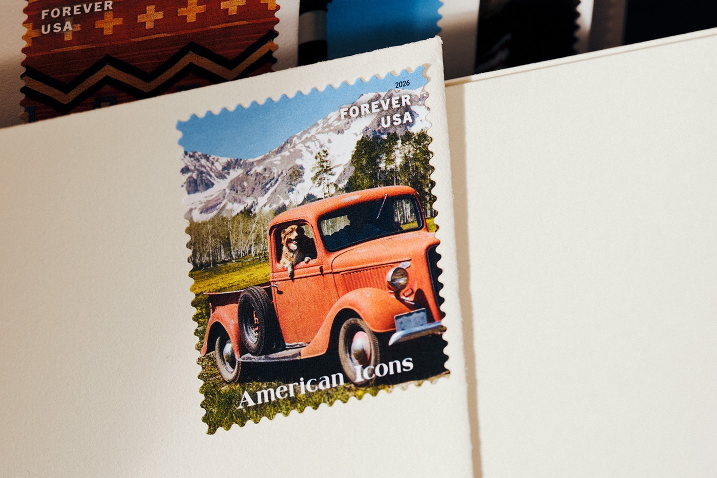 Special Delivery: Ralph Lauren Curates Historic USPS Stamp Collection for America's 250th Anniversary exclusive apparel capsule American Flag Sweater, a classic Polo Shirt, and a tailored Ball Cap united states accessories