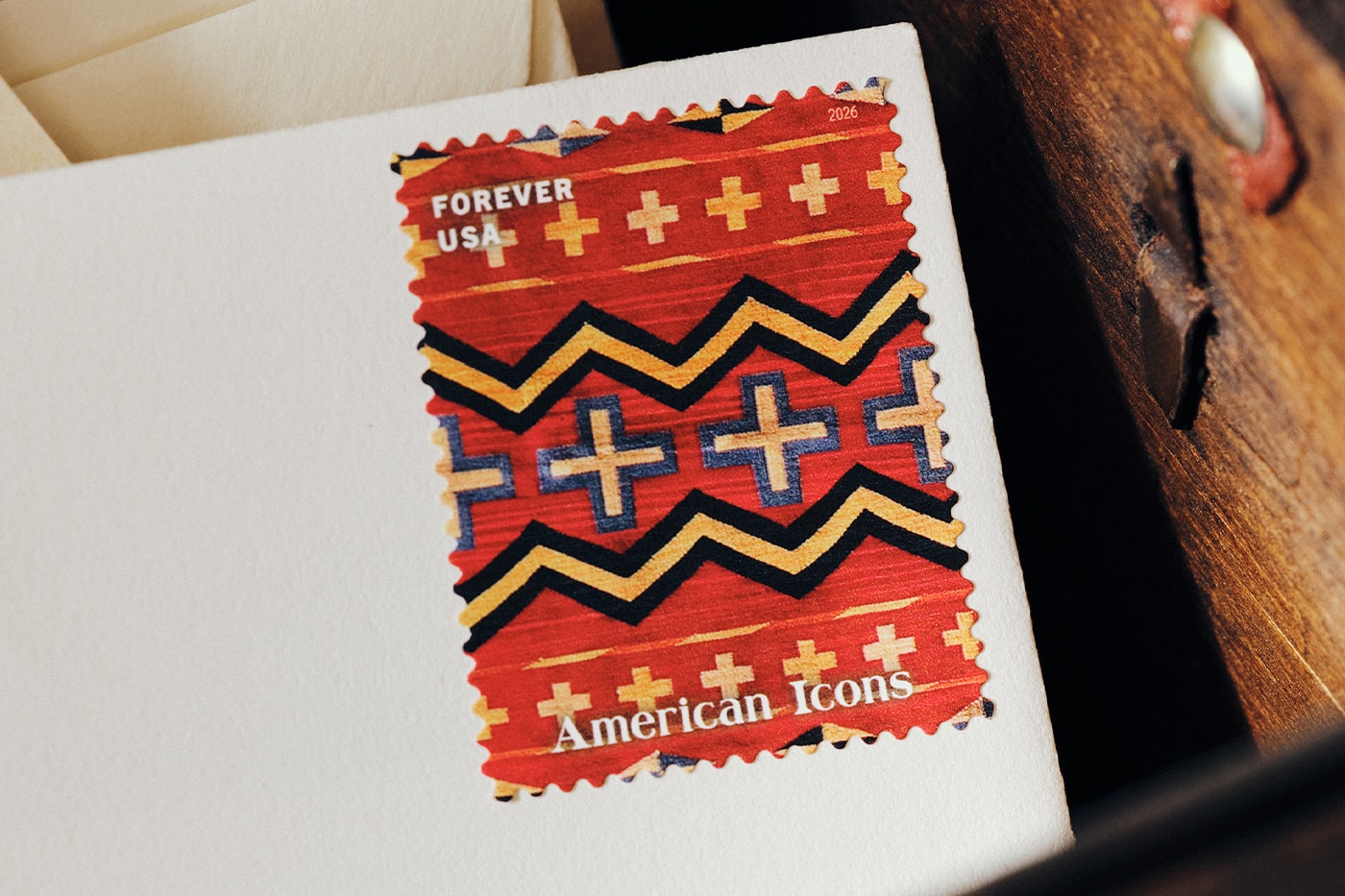 Special Delivery: Ralph Lauren Curates Historic USPS Stamp Collection for America's 250th Anniversary exclusive apparel capsule American Flag Sweater, a classic Polo Shirt, and a tailored Ball Cap united states accessories