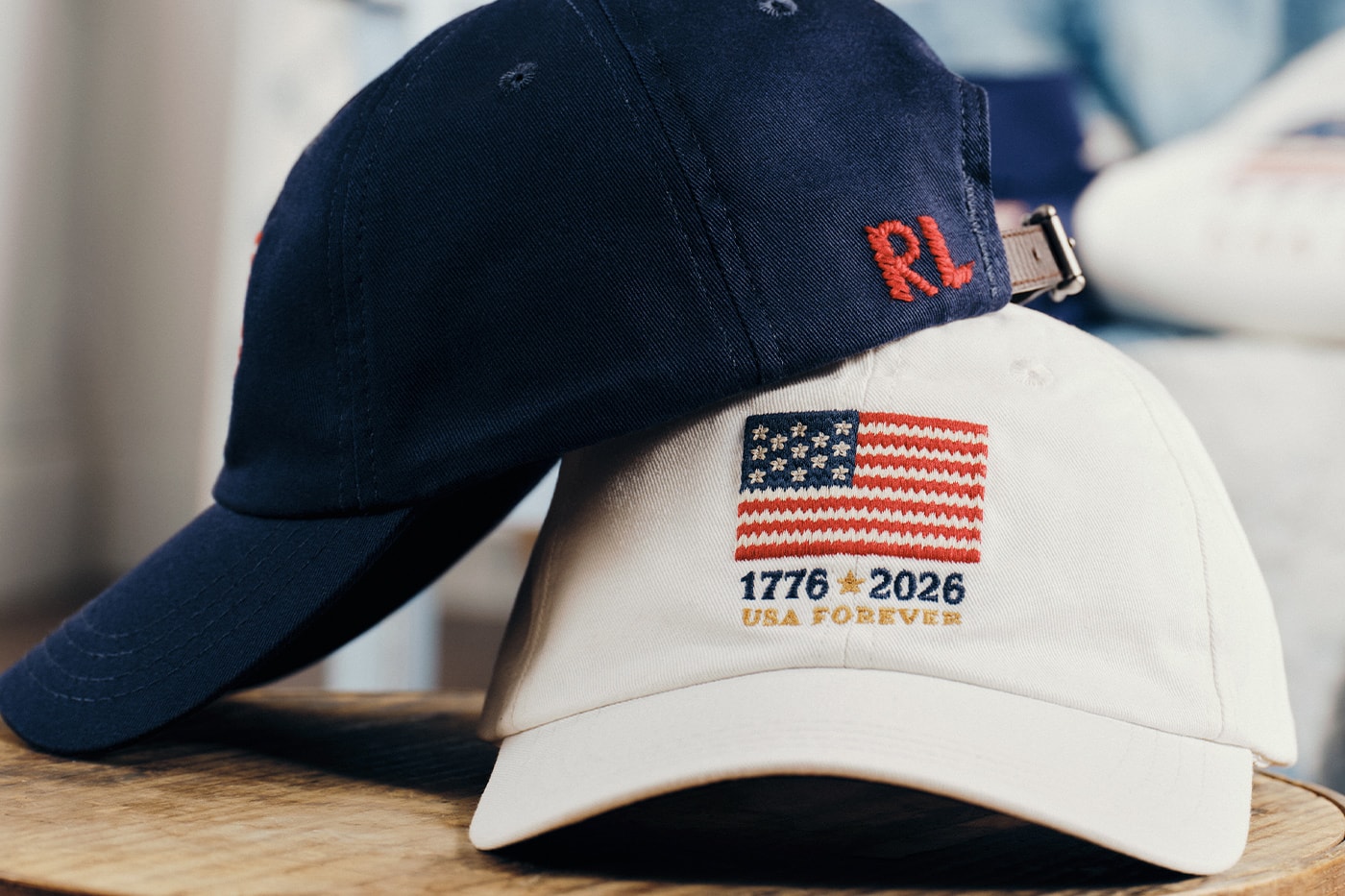 Special Delivery: Ralph Lauren Curates Historic USPS Stamp Collection for America's 250th Anniversary exclusive apparel capsule American Flag Sweater, a classic Polo Shirt, and a tailored Ball Cap united states accessories