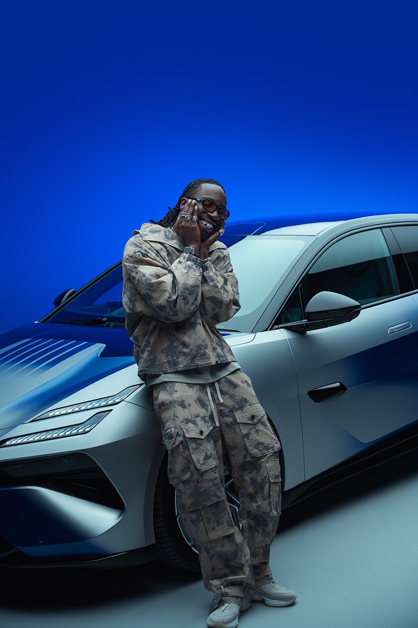 kojey radical lotus Emeya Hyper-GT in Royal Blue music car automotive mayfair london uk collaboration collab partnership royal albert hall album unveiling exclusive interview hypebeast streetwear fashion drop 