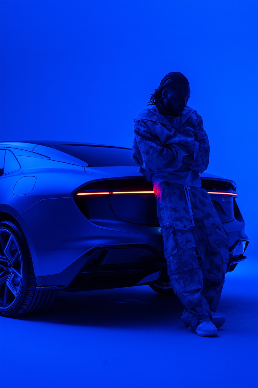 kojey radical lotus Emeya Hyper-GT in Royal Blue music car automotive mayfair london uk collaboration collab partnership royal albert hall album unveiling exclusive interview hypebeast streetwear fashion drop 