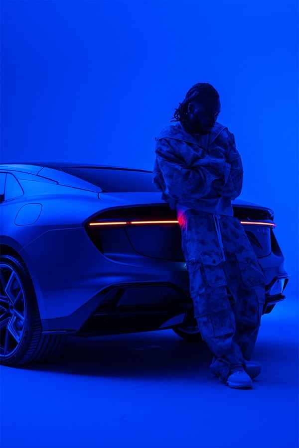 kojey radical lotus Emeya Hyper-GT in Royal Blue music car automotive mayfair london uk collaboration collab partnership royal albert hall album unveiling exclusive interview hypebeast streetwear fashion drop 