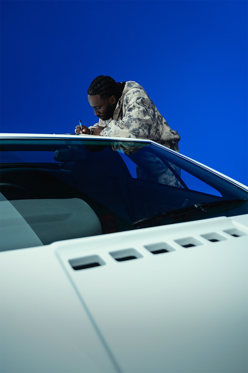 kojey radical lotus Emeya Hyper-GT in Royal Blue music car automotive mayfair london uk collaboration collab partnership royal albert hall album unveiling exclusive interview hypebeast streetwear fashion drop 