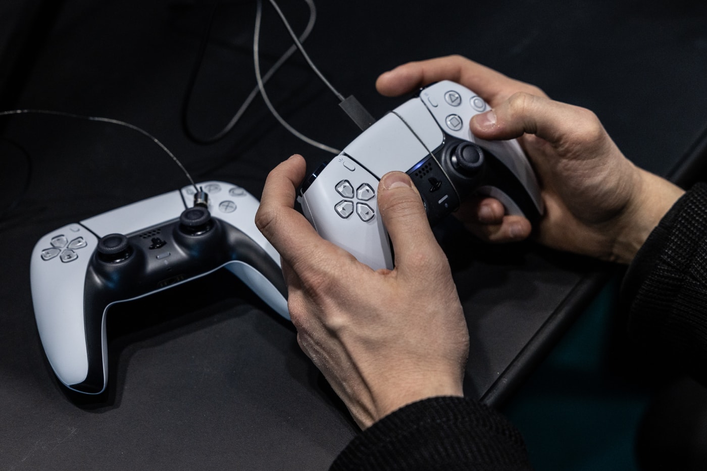 Sony PlayStation Plus Essential branding alongside PS5 console and controller