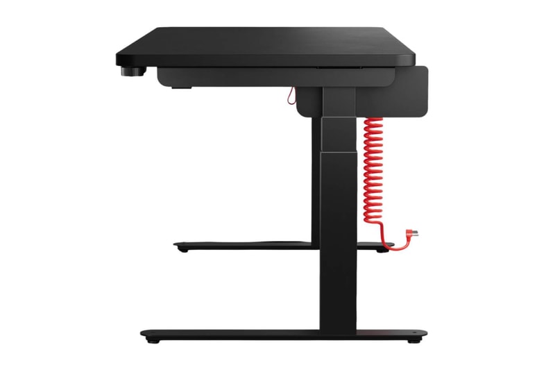 Herman Miller Coyl gaming standing desk with rotary height dial and red coiled power cable