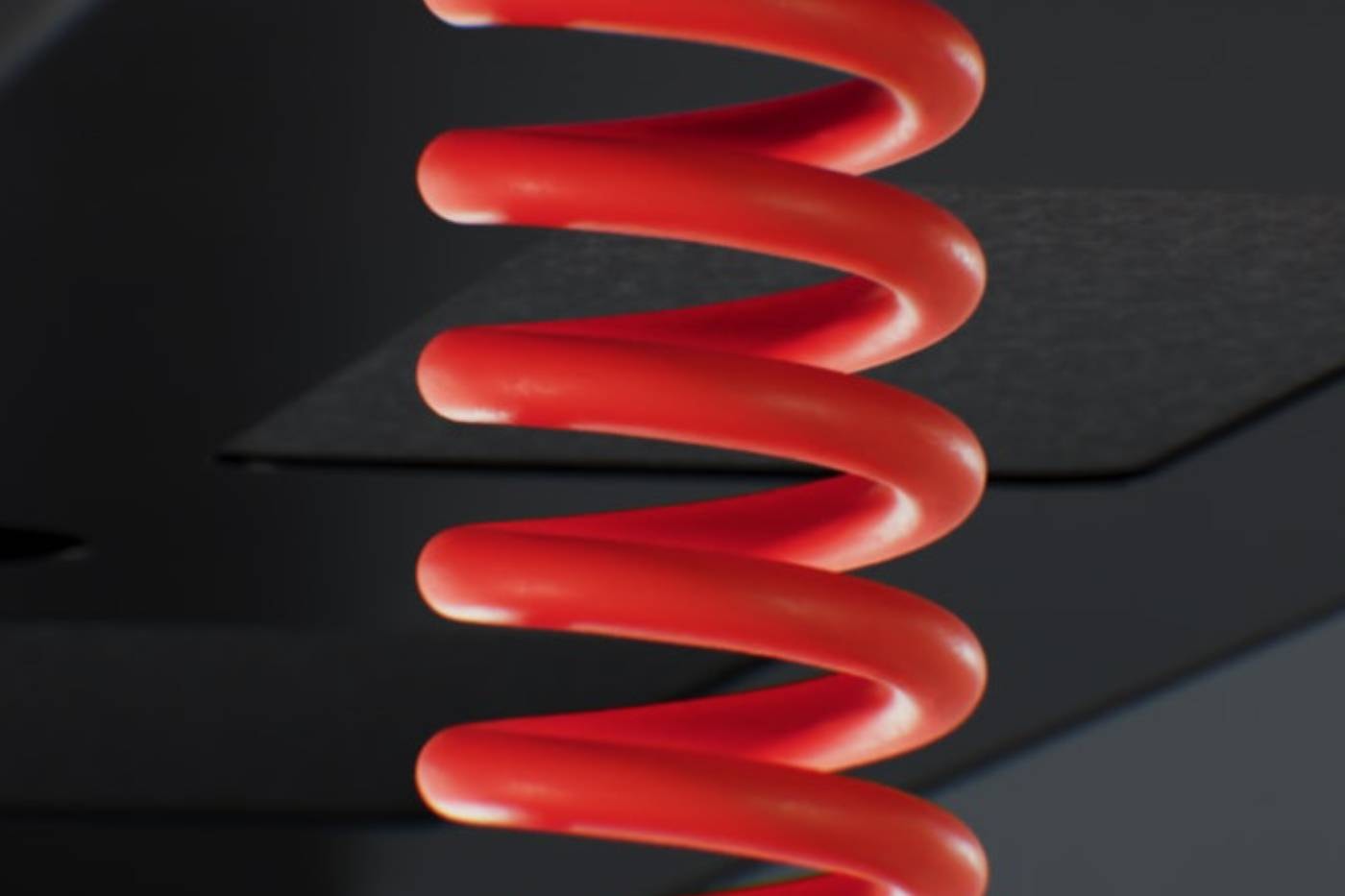 Herman Miller Coyl gaming standing desk with rotary height dial and red coiled power cable