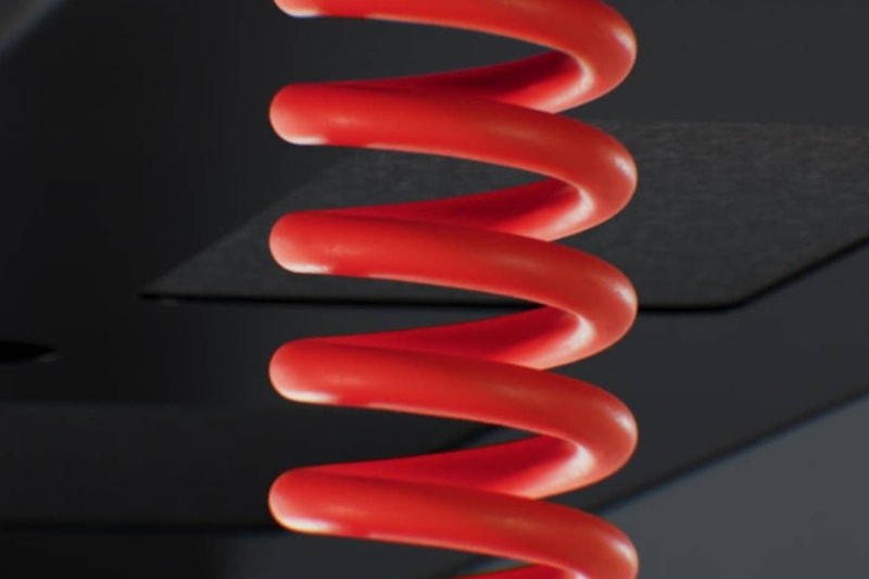 Herman Miller Coyl gaming standing desk with rotary height dial and red coiled power cable