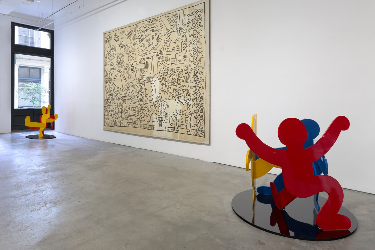 keith haring world in motion art artwork contemporary sixty white carlo mccormick paintings sculpture installation