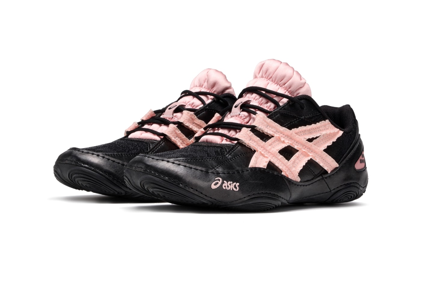 Empty Behavior x ASICS Hypersync Black Breeze top view showing heavily padded tongue and dual toe box branding